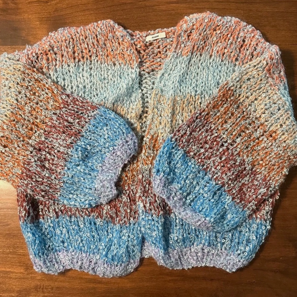 A chunky cardigan from Maiami in a rainbow of colors Size M/L